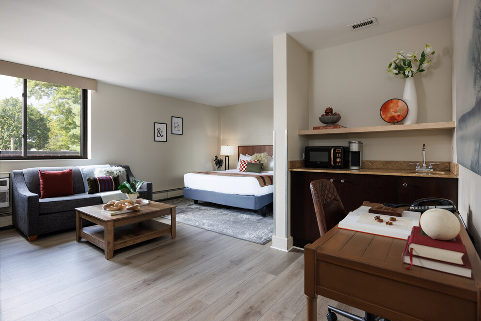 a room with a bed and a table